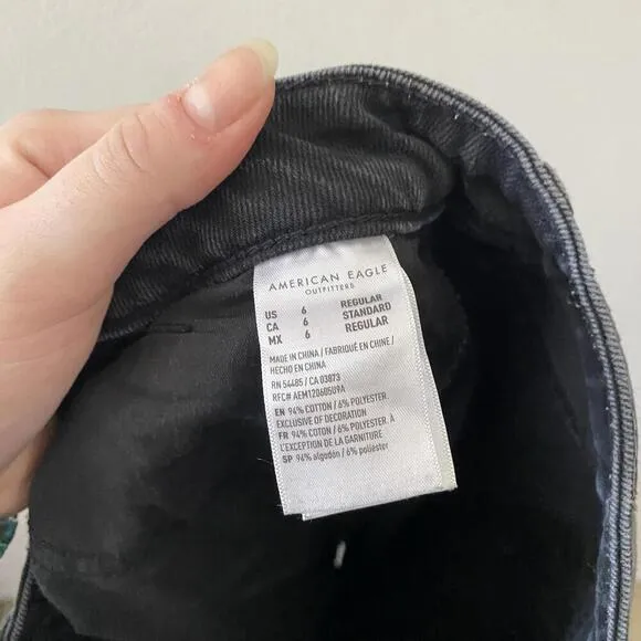 AMERICAN EAGLE black high rise busted knee mom jeans