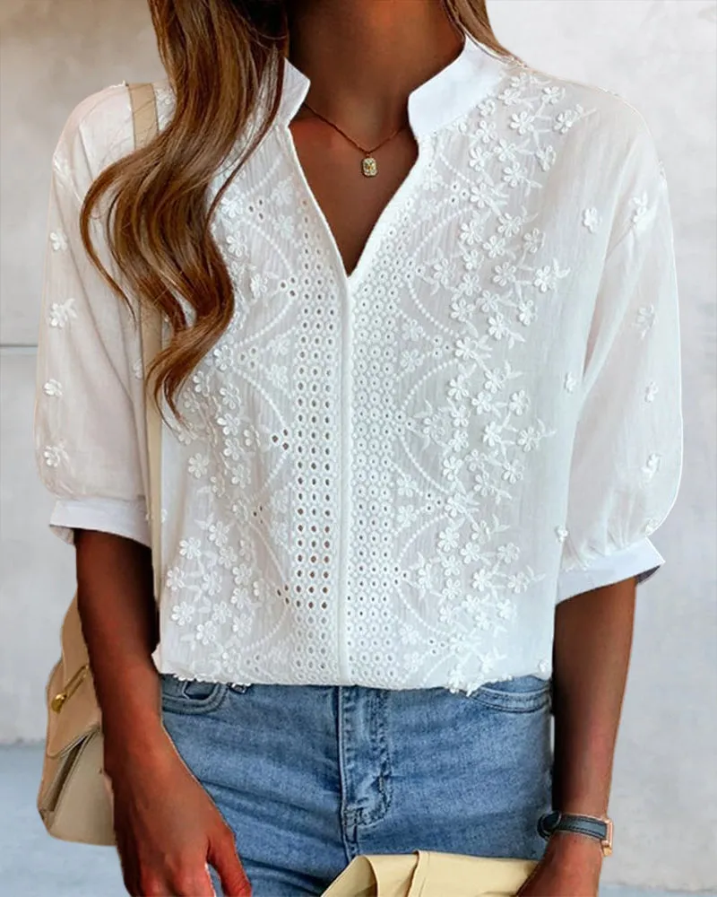 Blouse with V-neck, puff sleeves, and lace decoration