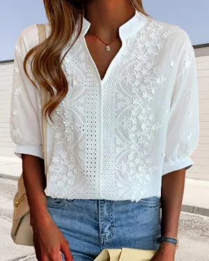 Blouse with V-neck, puff sleeves, and lace decoration