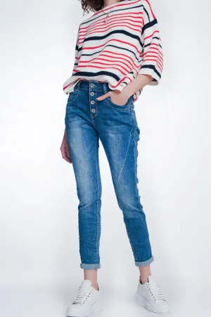Boyfriend cut jeans with buttons in mid blue wash
