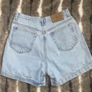 Calvin Klein Jeans High Waisted Mom Jean Shorts