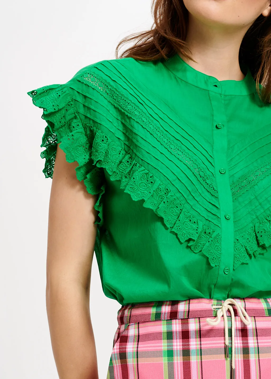 Green ruffled top