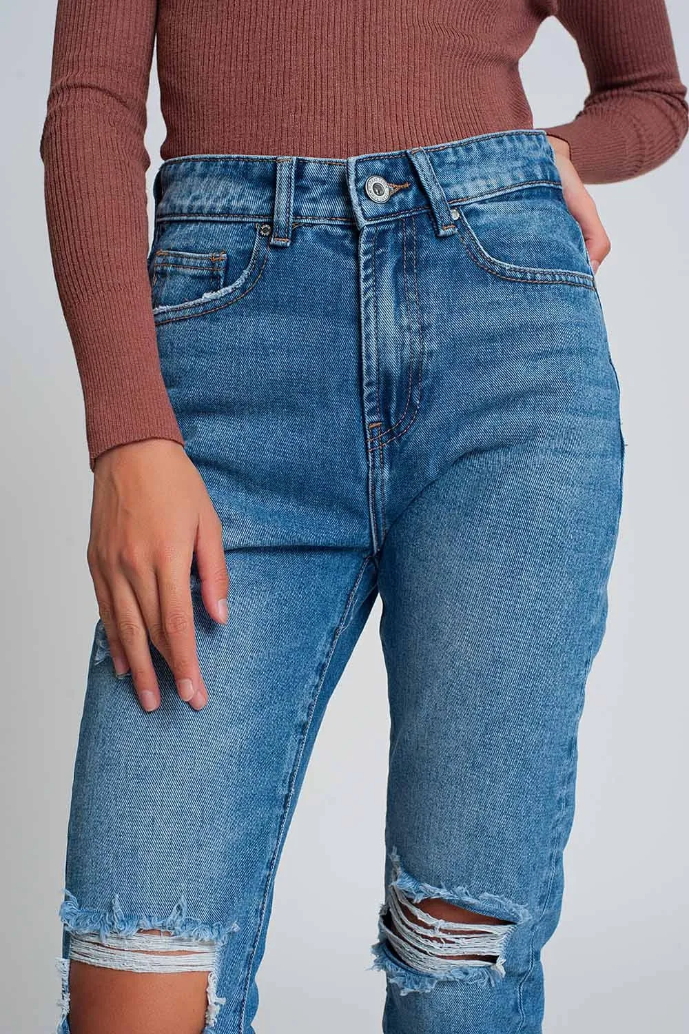 High waist mom jeans with ripped knees in dark wash blue