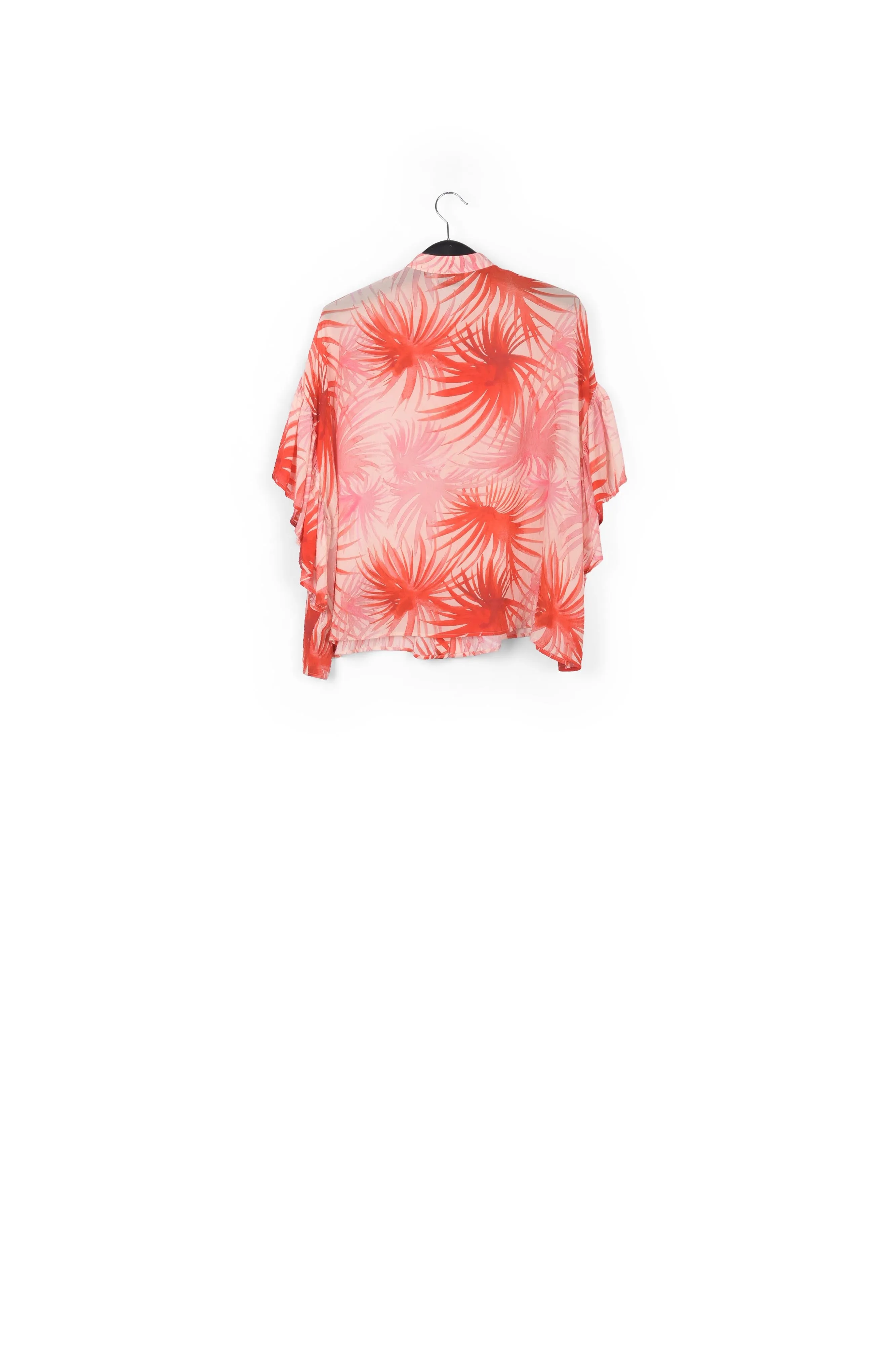 Orange ruffle-detailed top with palm leaf print