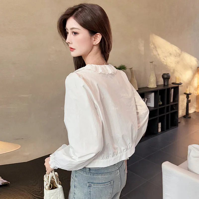 Relaxed-Fit Silk Blouse with Round Neck and Ruched Sleeves