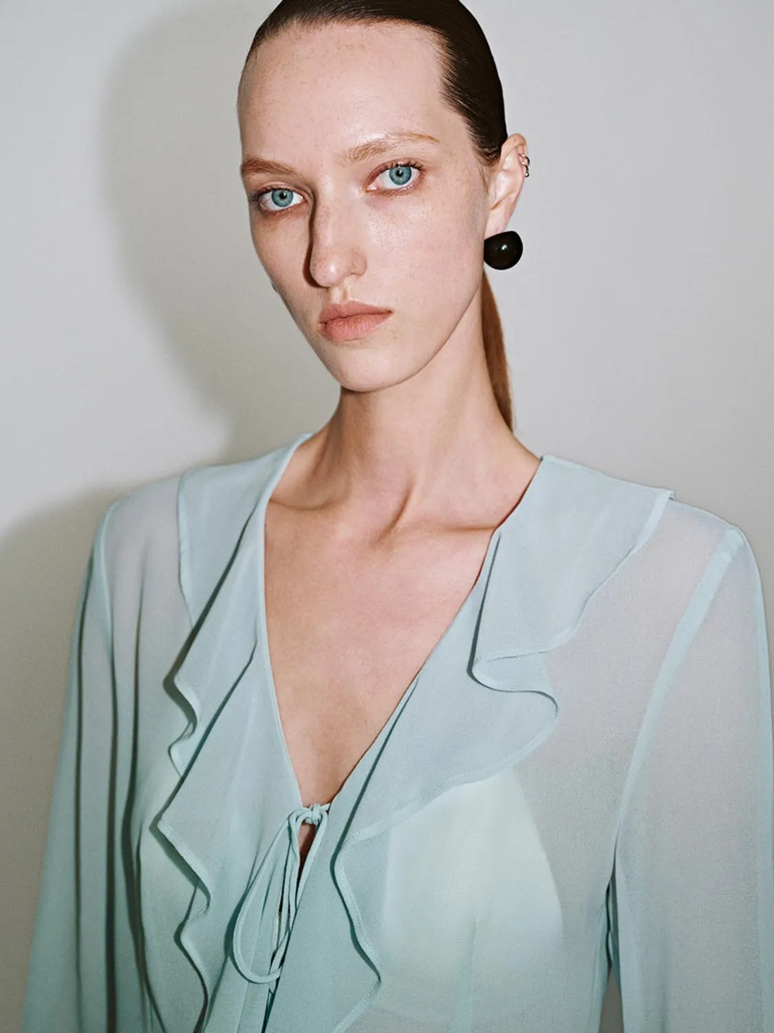 Sheer Ruffle Hem Blouses