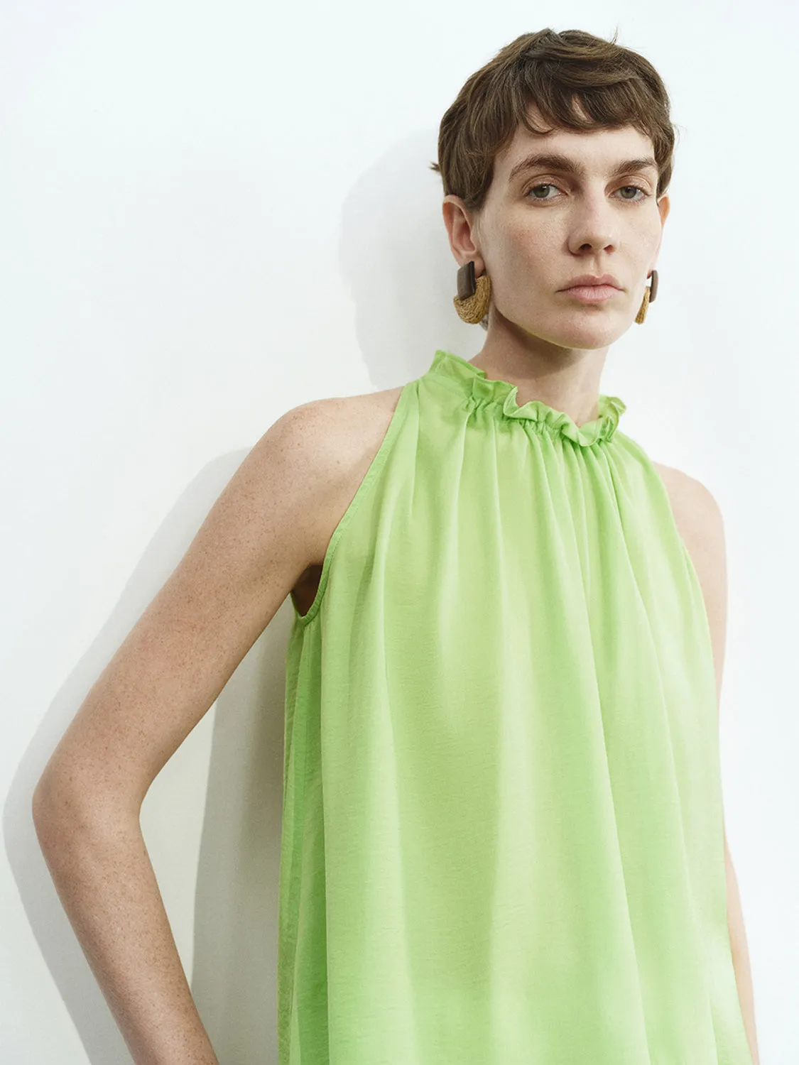 Sleeveless Ruffle Tie Blouses