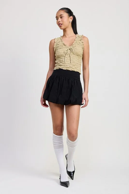 SLEEVELESS RUFFLE TOP